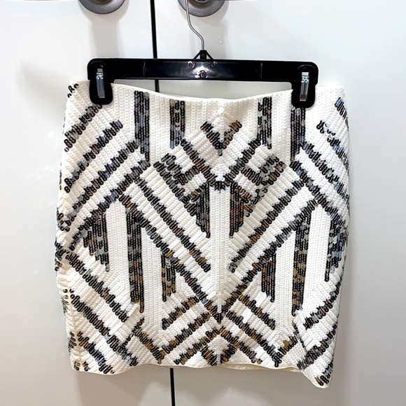 Express Dresses & Skirts - Express, white sequence mini skirt, size M brand new, never worn.